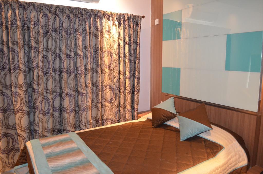 Itsy Hotels Hiland Suites Μπανγκαλόρ Δωμάτιο φωτογραφία