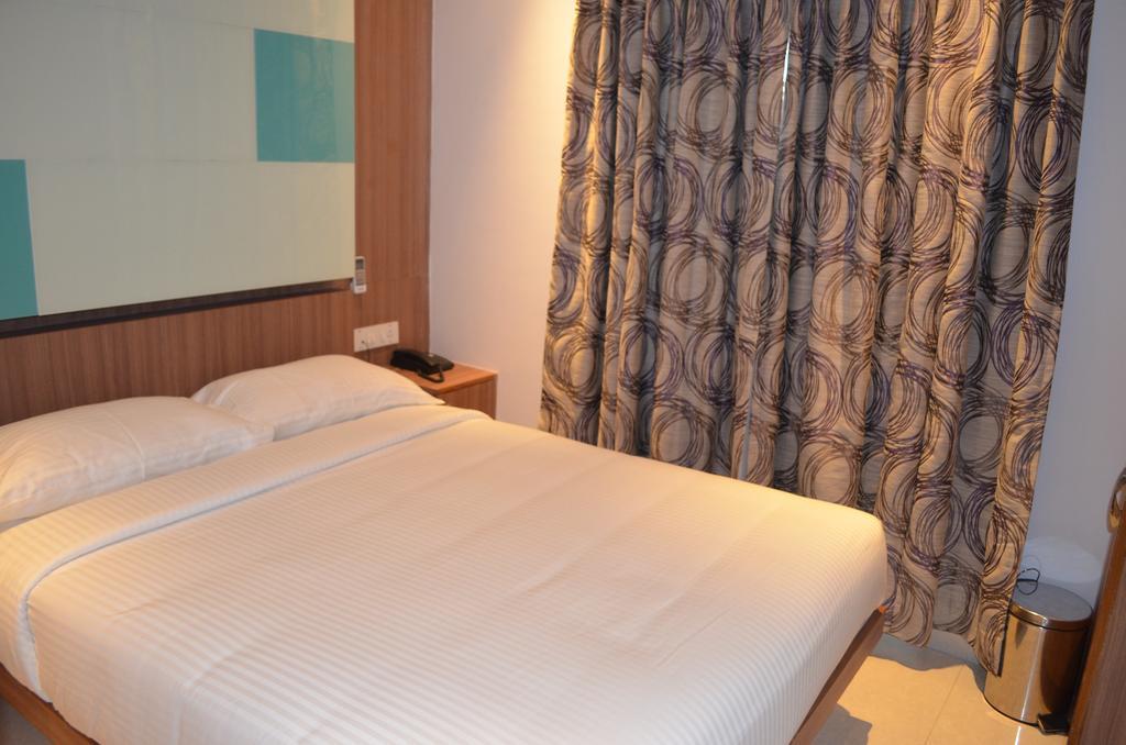 Itsy Hotels Hiland Suites Μπανγκαλόρ Δωμάτιο φωτογραφία